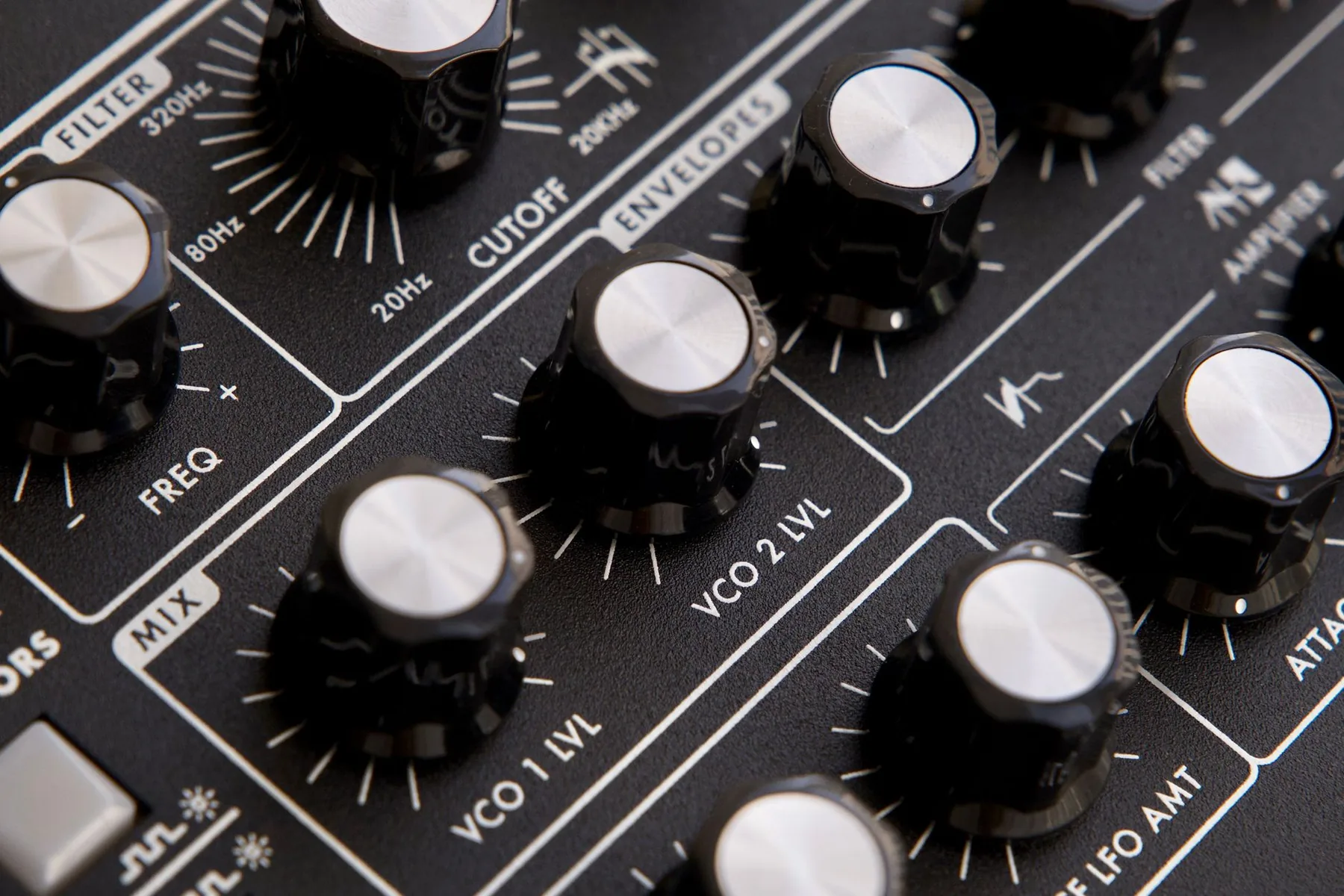 Analog controls of a musical synthesizer
