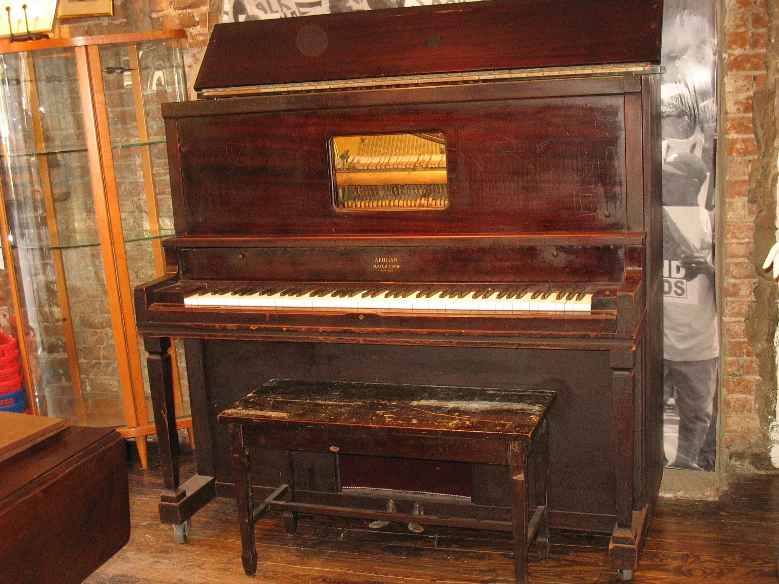 Old wooden upright piano